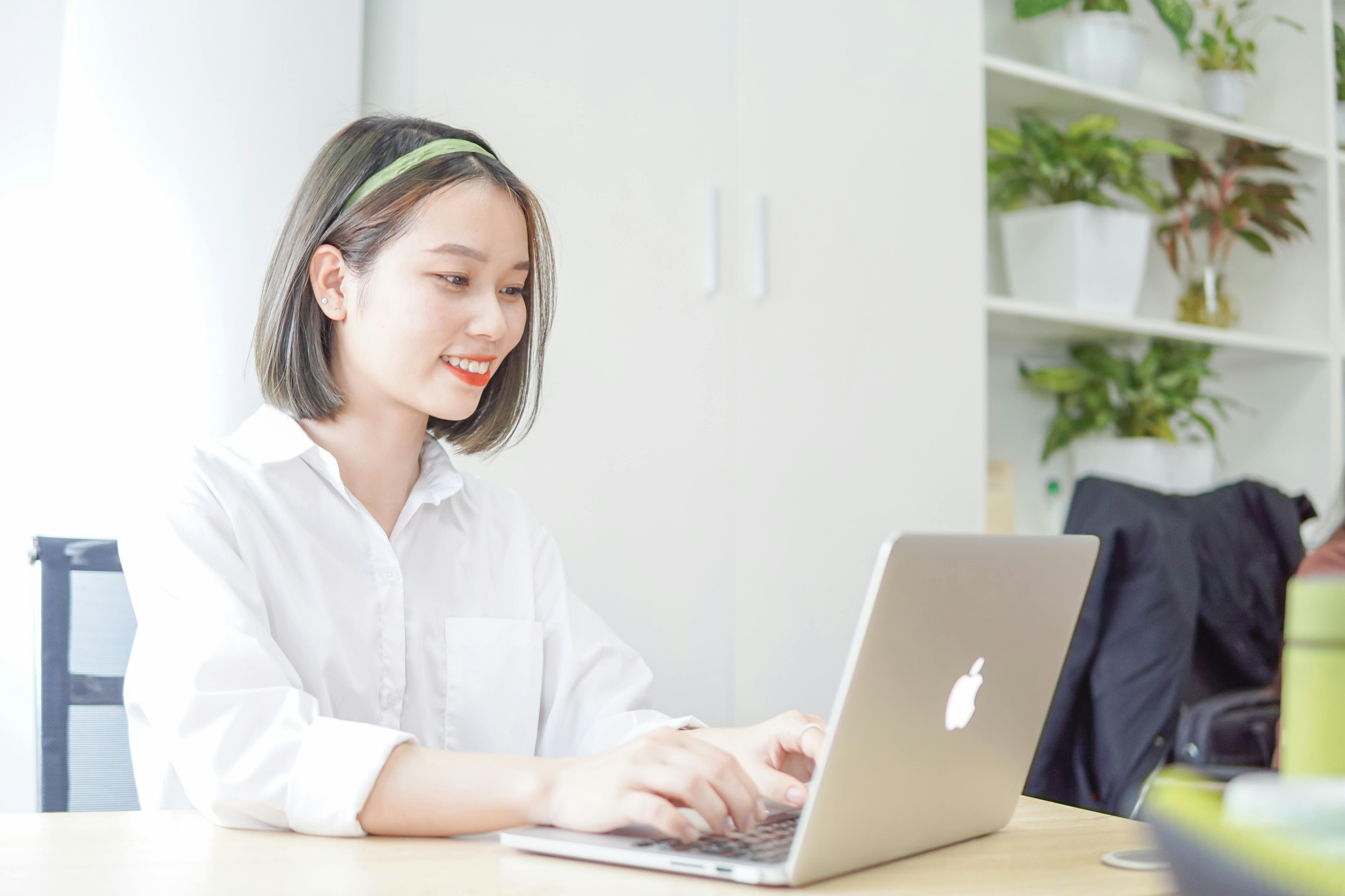 Person researching property data on a laptop